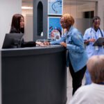 Receptionist Job in Cape Town (Permanent) African american patient filling in report papers